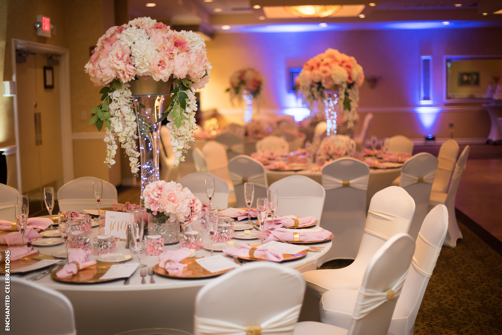 Bride and groom chose to decorate the Atlantis Ballroom in pretty pinks and gold accents.